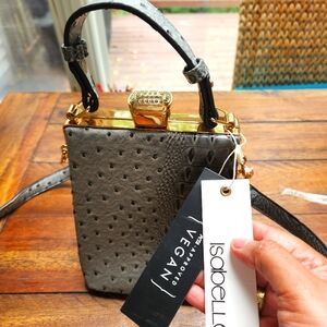Isabelle NWT vegan crossbody/sachel Gray with handle and adjustable strap.